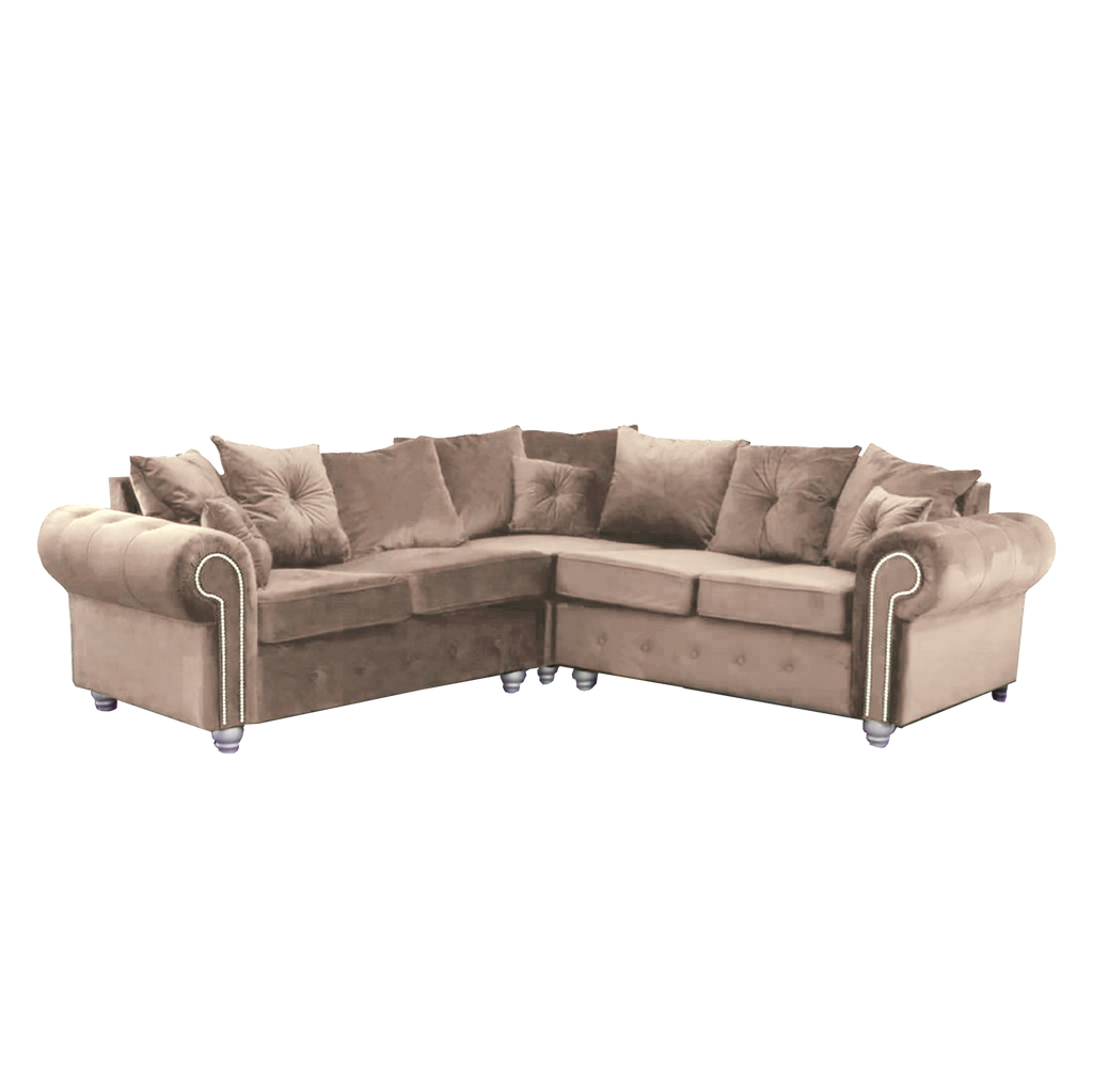 Furnish UK Ashwin tufted corner sofa in beige velvet with rolled arms and multiple cushions