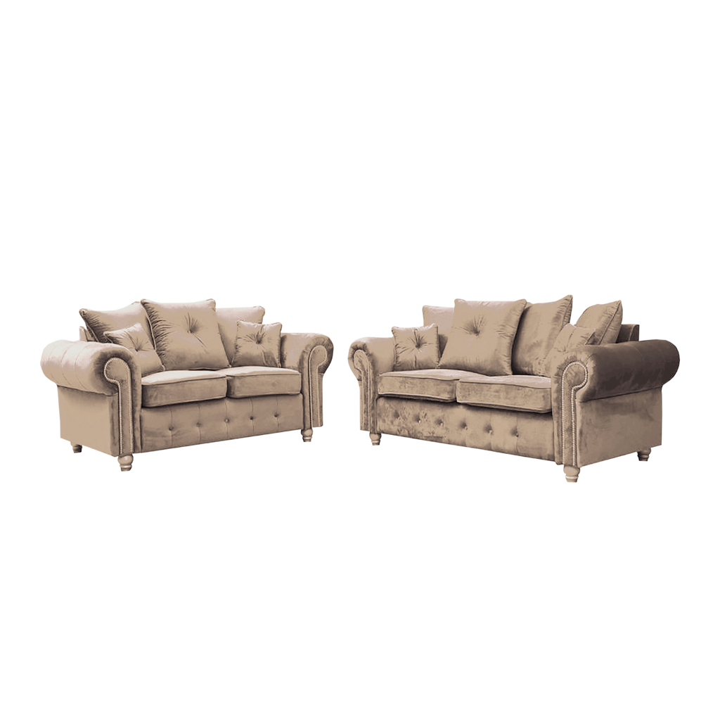 Ashwin tufted corner sofa set by Furnish UK with beige velvet upholstery and multiple cushions