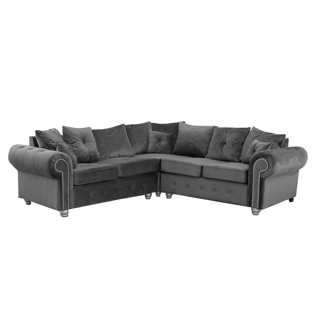 Furnish UK Ashwin tufted corner sofa in dark gray with rolled arms and multiple cushions