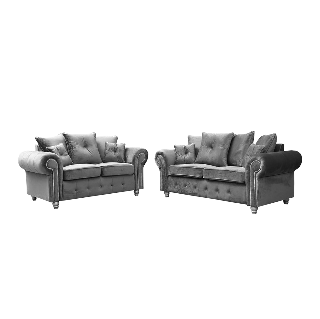 Ashwin tufted corner sofa set by Furnish UK in grey velvet with rolled arms and multiple cushions