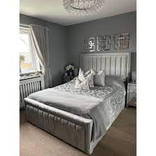 Furnish UK bumper panel line bed frame in gray velvet with padded headboard and footboard in modern bedroom