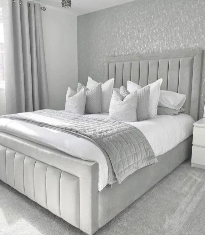Furnish UK bumper panel line bed frame in light gray with vertical padded panels and matching headboard
