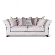 Comfortable L shaped sofa UK in light gray with plush cushions and nailhead trim by Furnish UK