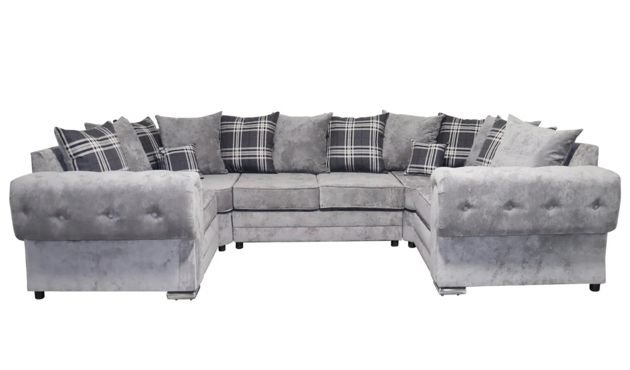 Furnish UK dark grey suede u-shape sofa with button tufted arms and plaid cushions