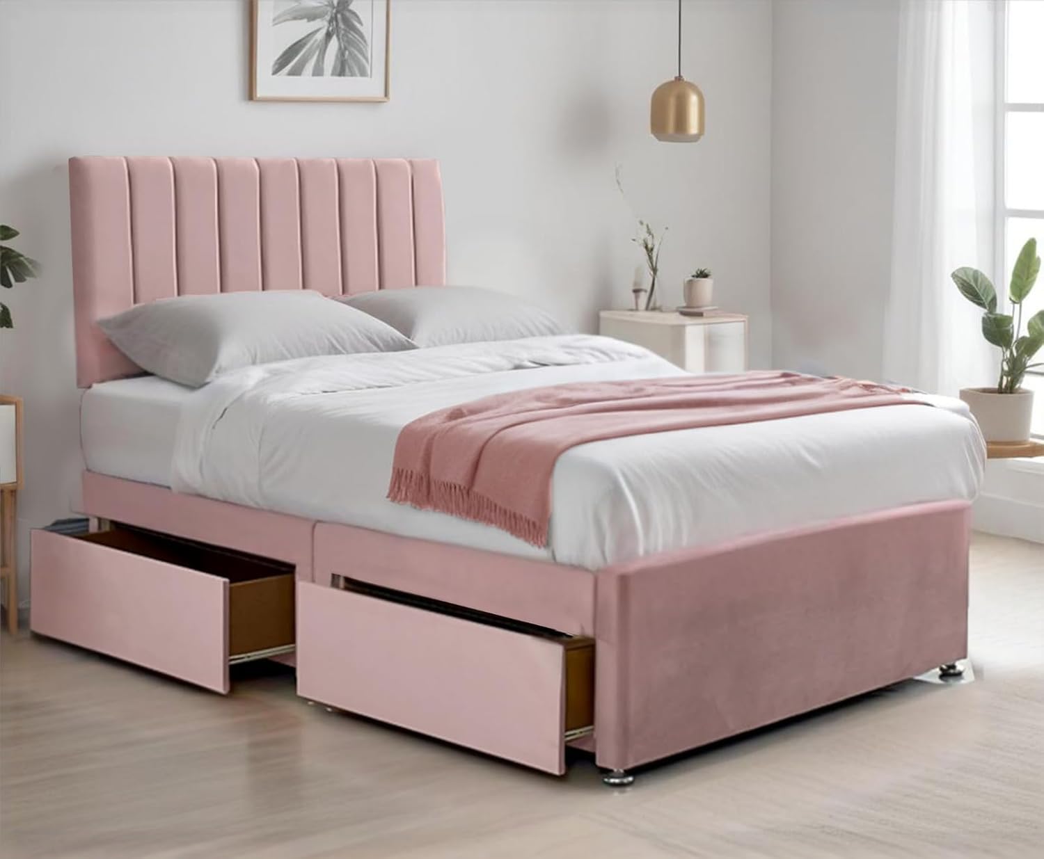 Pink divan bed with panel headboard and underbed storage drawers in modern bedroom