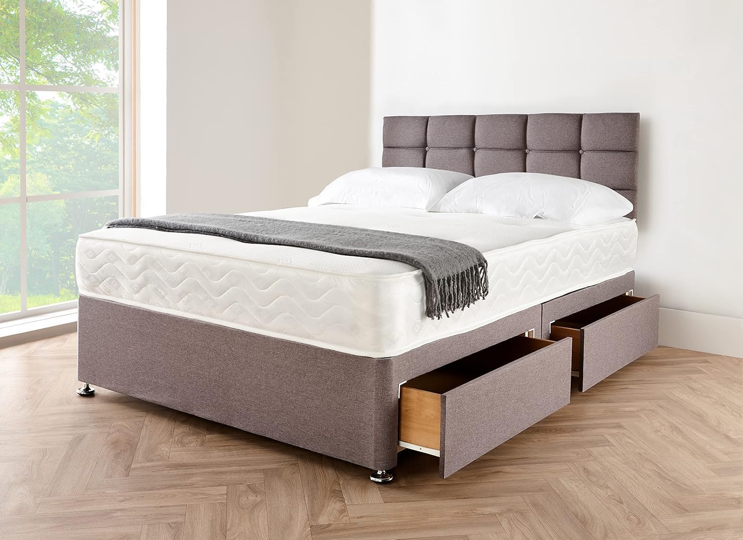 Furnish UK divan bed with storage drawers in gray fabric featuring a tufted headboard and white bedding