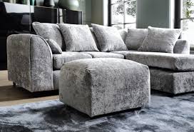 Dylan crushed velvet corner sofa by Furnish UK in gray with matching ottoman in modern living room