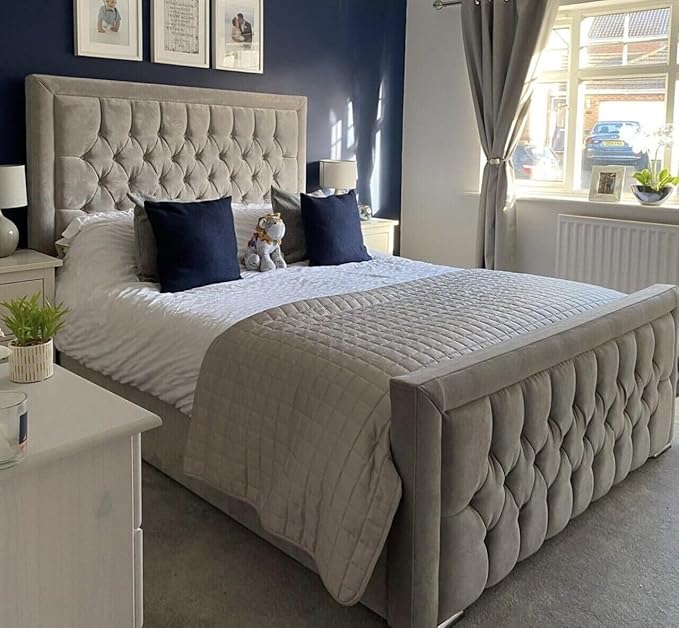 Furnish UK luxury velvet bed frame in light gray with tufted headboard and footboard in a cozy bedroom