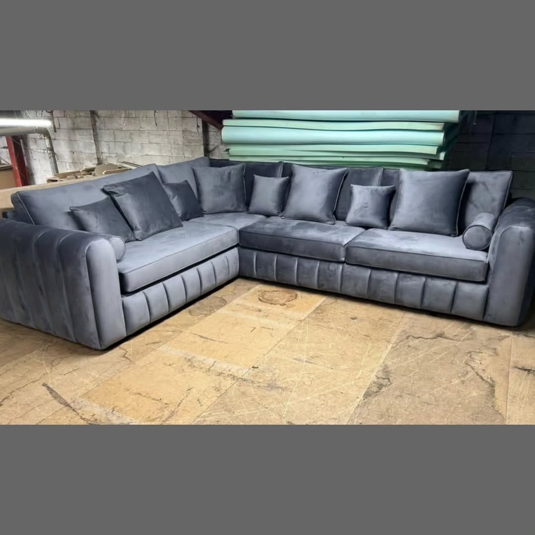 Furnish UK modern L-shaped sofa in gray velvet corner sofa with multiple cushions and soft seating