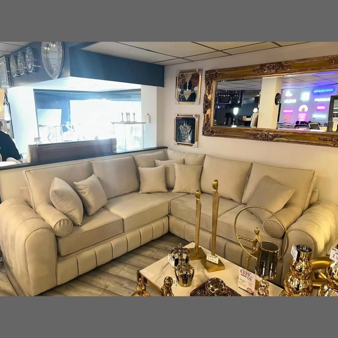 Furnish UK beige modern L-shaped sofa with plush cushions in a stylish living room setting