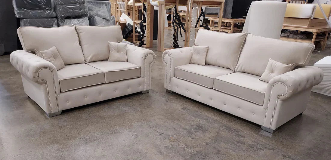 Cream-colored Olympia sofa set for living room with plush cushions and rolled arms by Furnish UK
