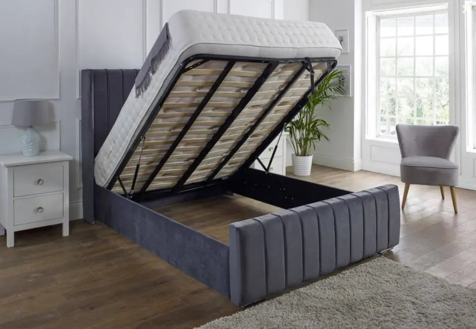 Furnish UK ottoman storage wingback bed in gray fabric with lift-up mattress showing spacious storage area