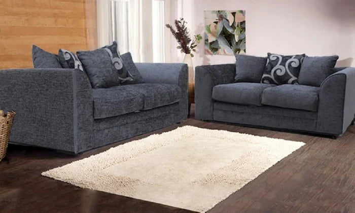 Dylan 3 and 2 seater sofa bundle in dark gray fabric by Furnish UK with decorative cushions in a modern living room