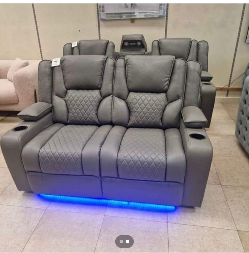 Furnish UK electric leather recliner sofa in gray with quilted seating and blue LED lighting