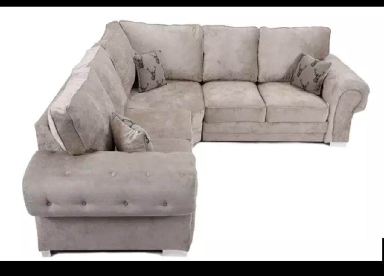 Verona corner sofa by Furnish UK in light gray with cushioned seats and decorative pillows