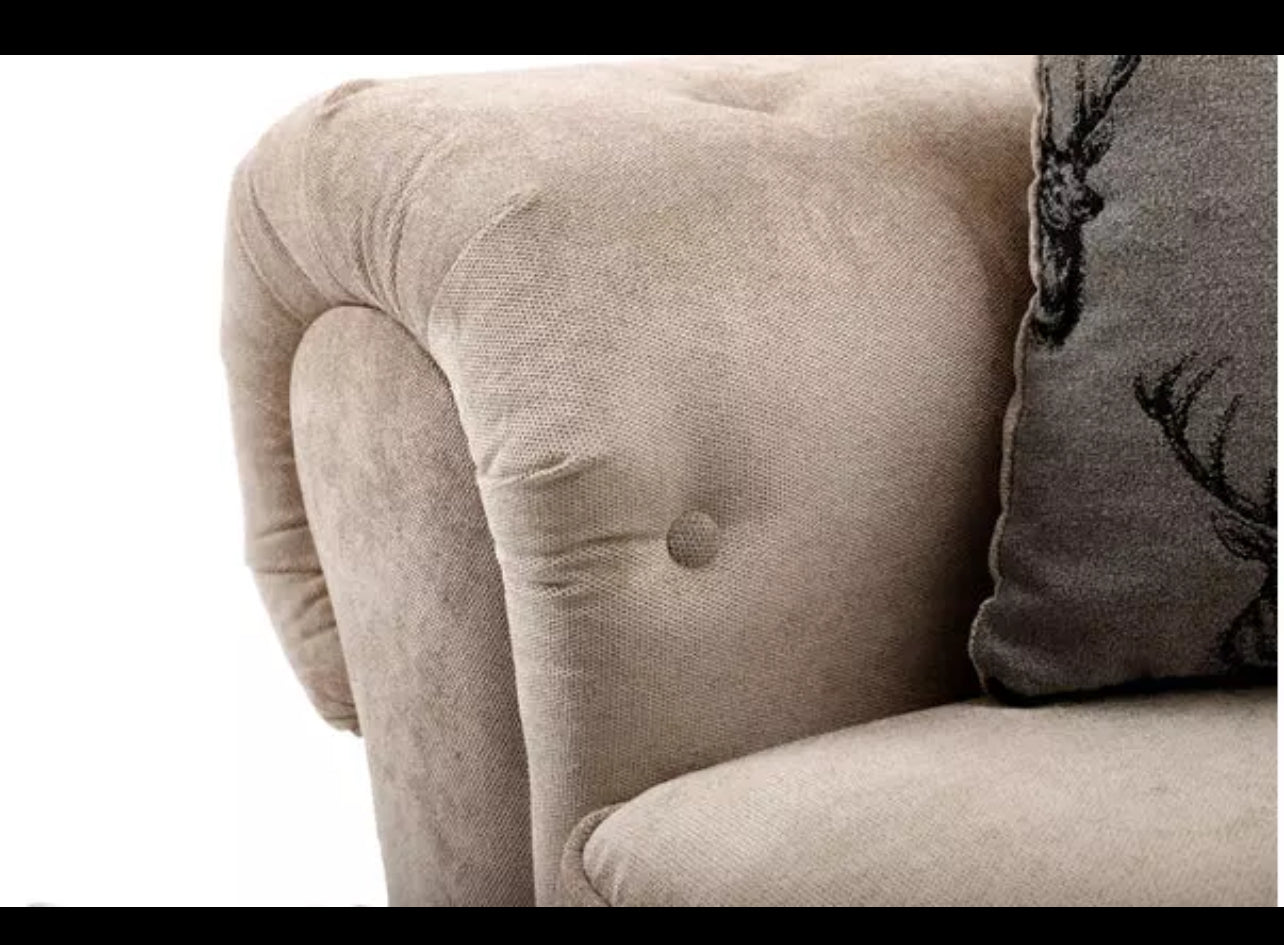 Close-up of beige upholstery on the Verona corner sofa by Furnish UK showing soft fabric and button detailing