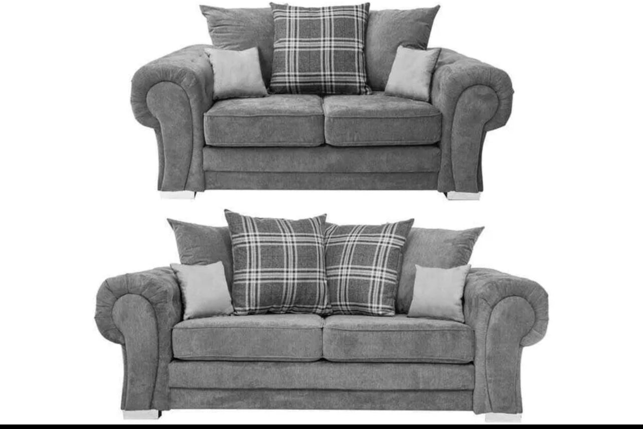 Furnish UK Verona corner sofa in gray fabric with rolled arms and plaid accent cushions