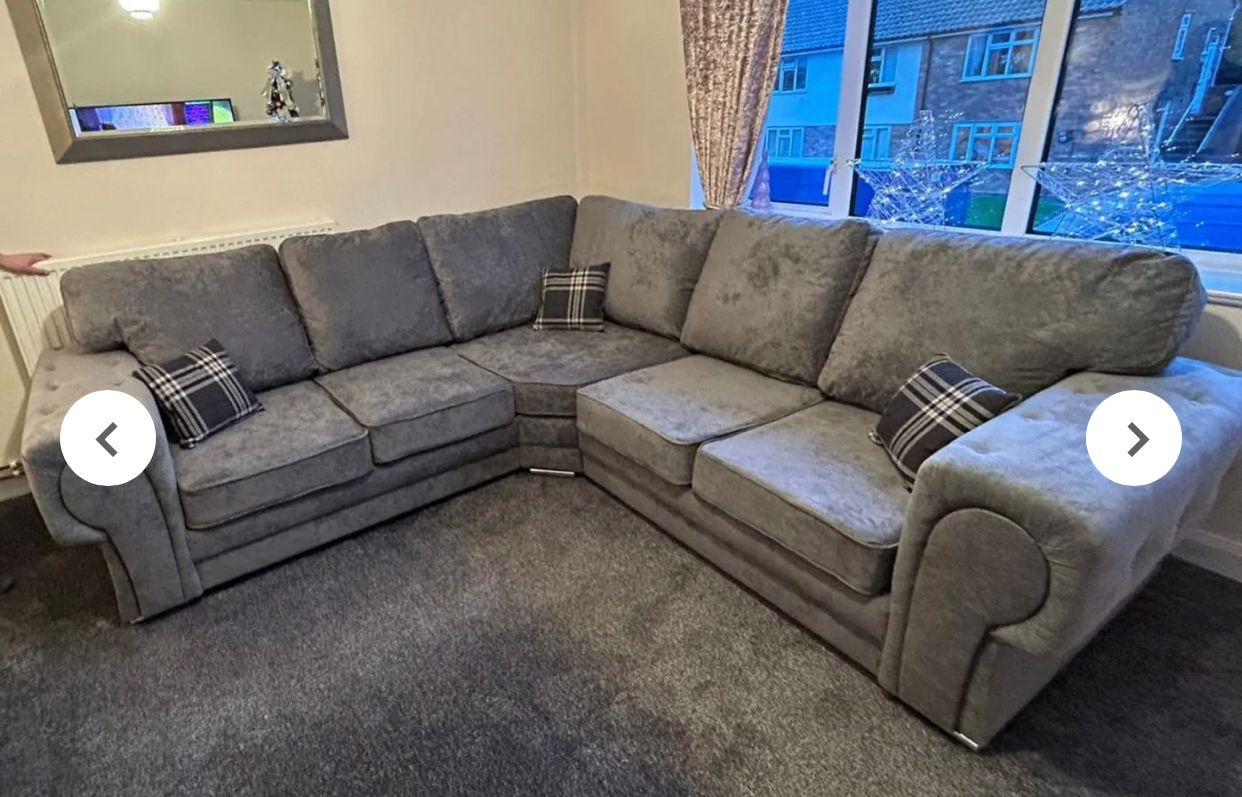 Verona corner sofa by Furnish UK in plush gray fabric with cushioned seats and decorative plaid pillows